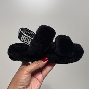 UGG “Oh Yeah” Slide Sandals in Black Sheepskin with an Elastic UGG Logo Strap